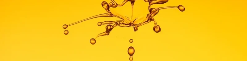 auf gelbem Hintergrund sieht man einen Spritzer